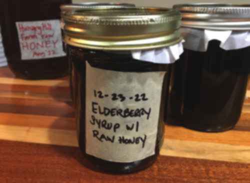 jar of labeled elderberry syrup